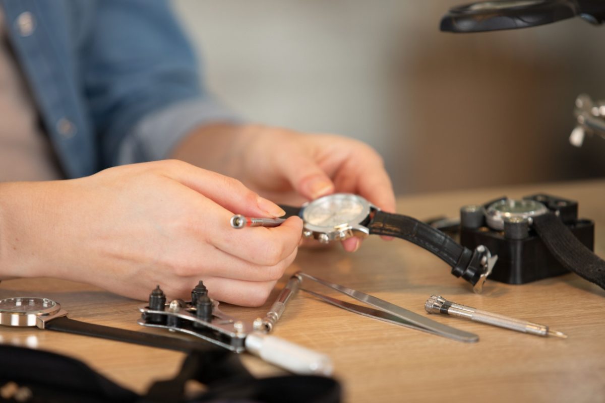 A man repairing a watch.